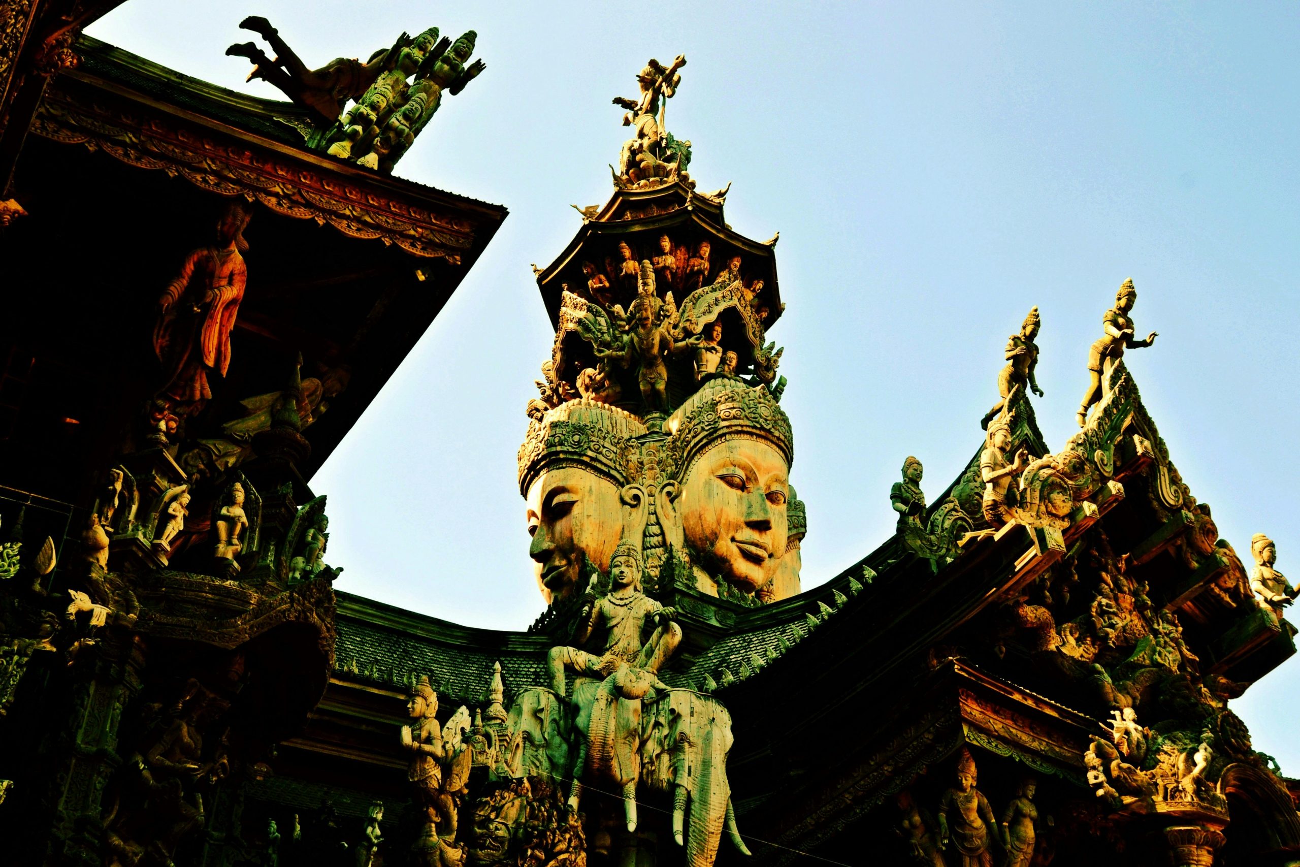 Explore the detailed wooden carvings of the Sanctuary of Truth in Pattaya, Thailand.
